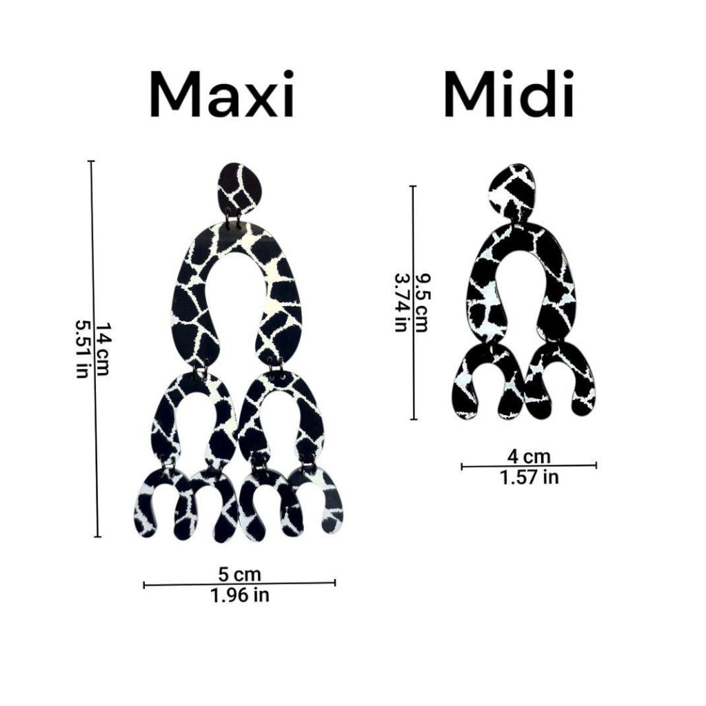 Brincos longos articulados com estampa preto e branco tipo girafa mostrando medidas em centímetros e polegadas